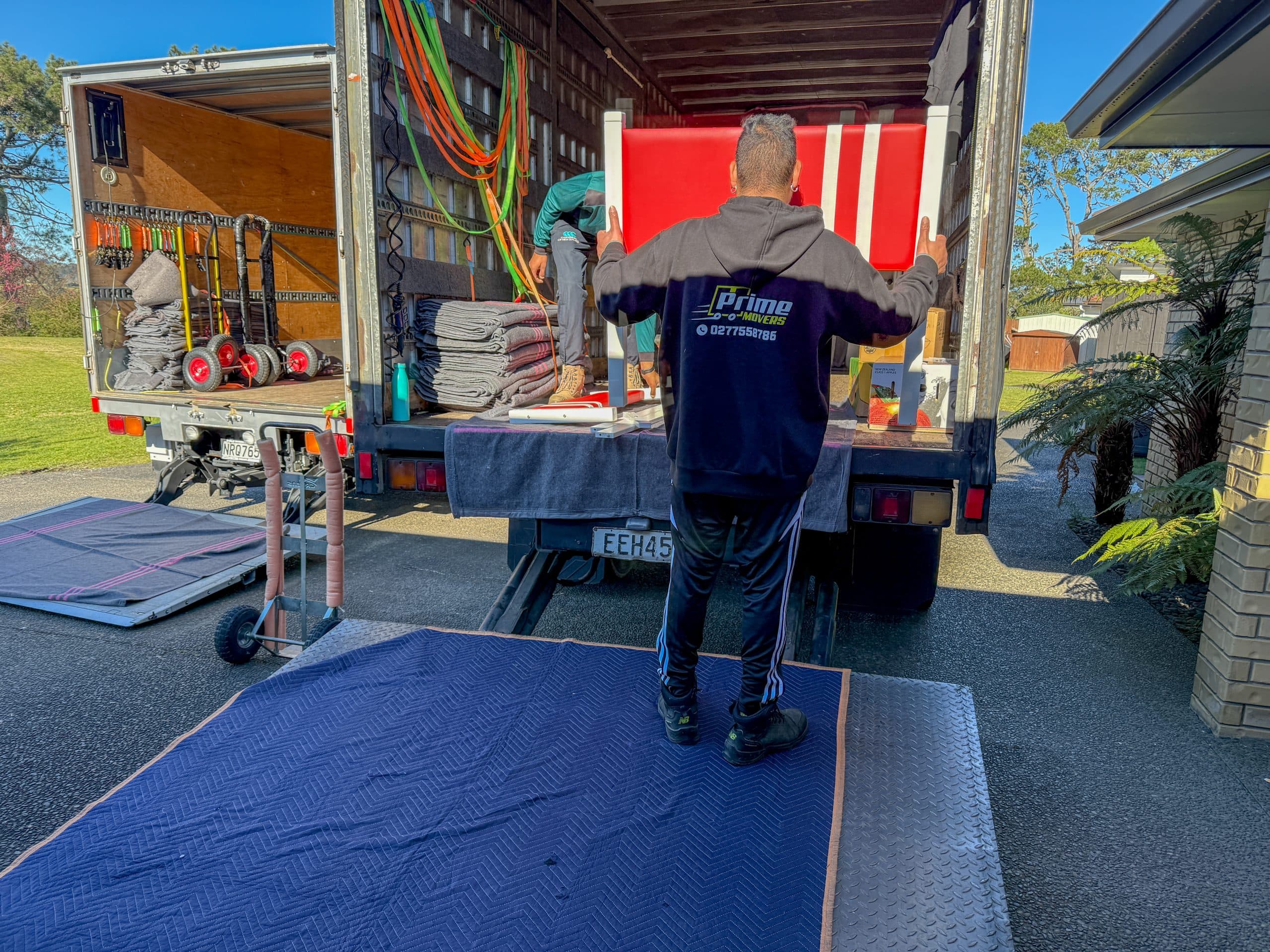 Team Member Loading a big furniture